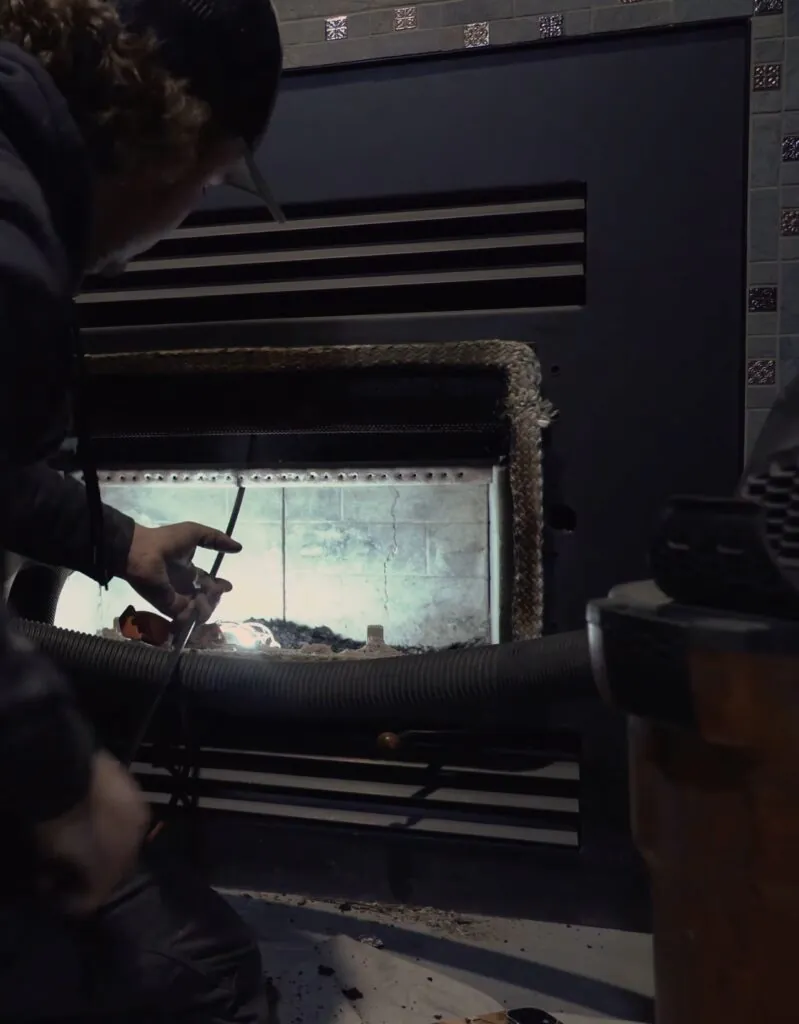 CSIA certified technician performing Level 2 video camera chimney inspection with HD equipment in Greenville SC